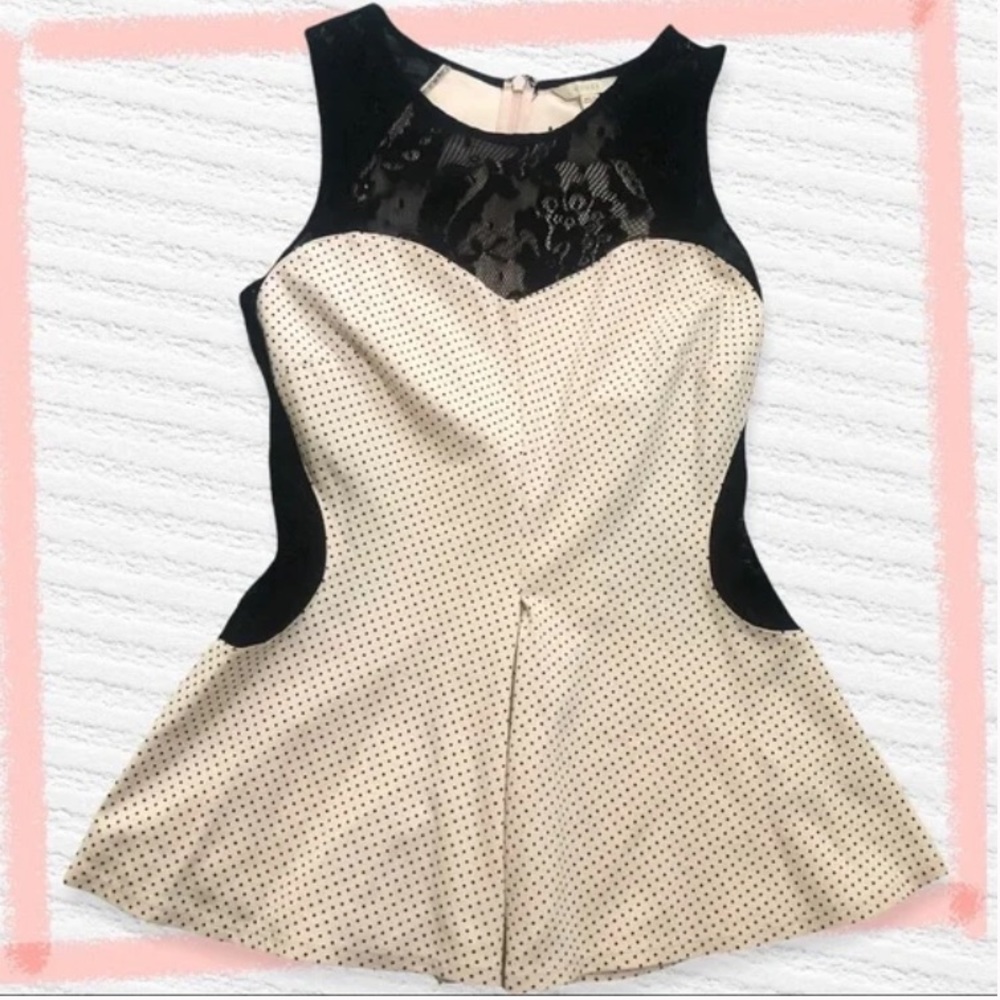 Guess sleeveless peplum and mesh top